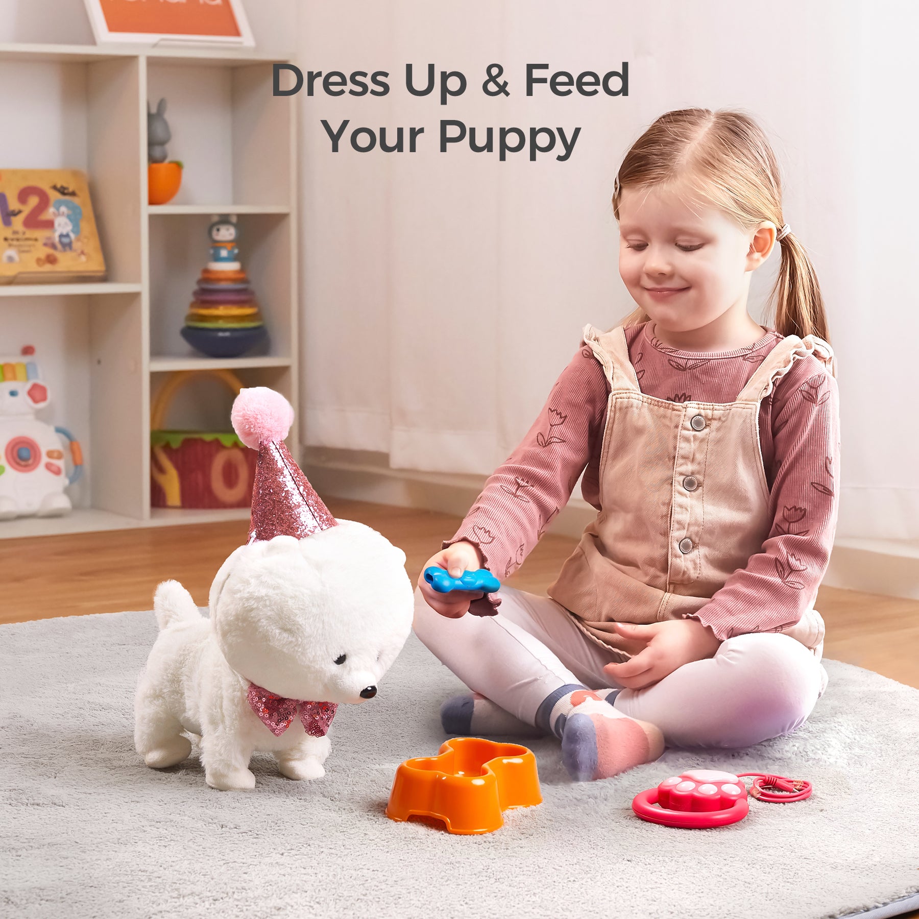 A young girl sitting on a rug, playing with a plush puppy dressed in a sparkly pink party hat and bowtie. She is holding a toy bone and