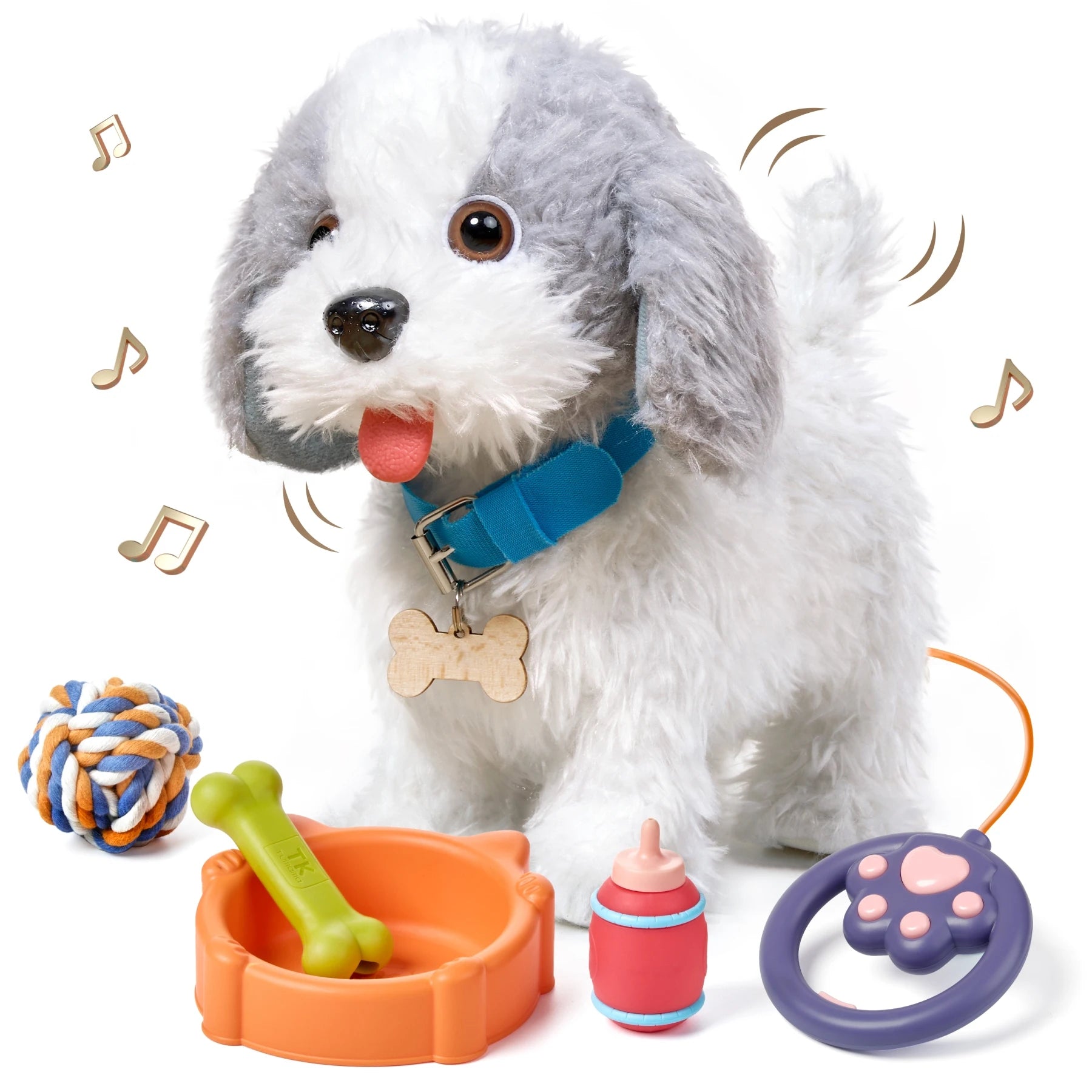 A gray-and-white plush walking dog toy wearing a blue collar with a bone-shaped tag. The toy is surrounded by accessories: an orange food bowl with a green bone, a red-and-blue milk bottle, a colorful rope ball, and a purple paw-shaped leash remote.