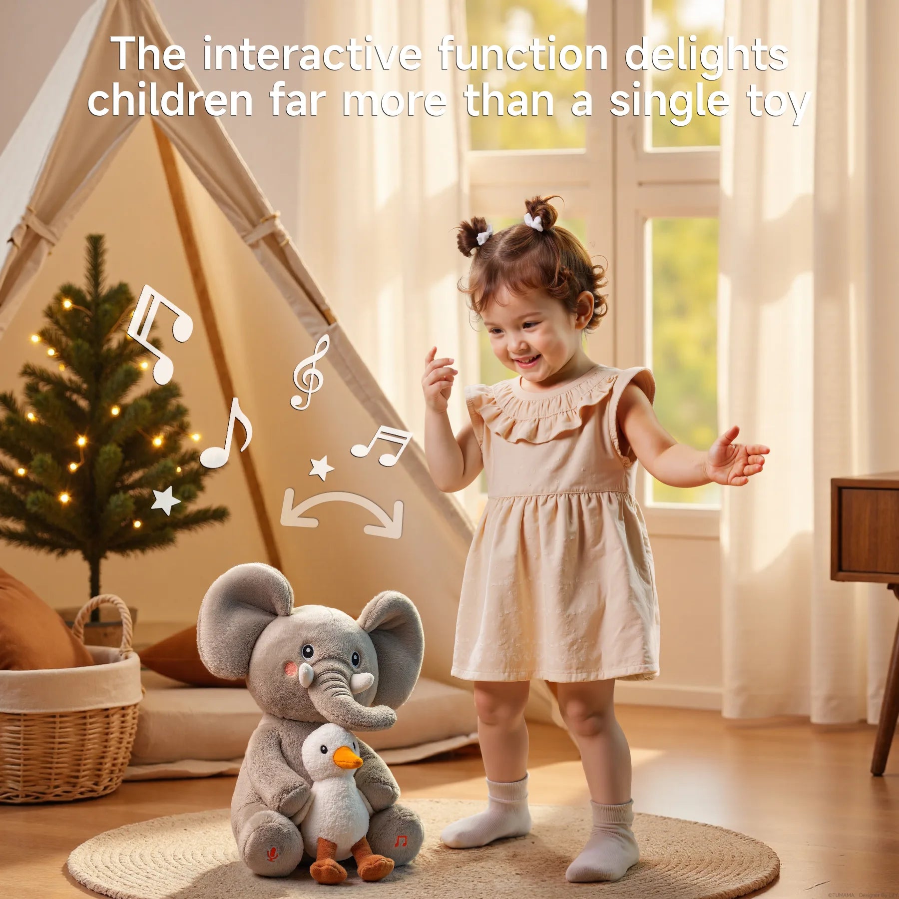 Smiling toddler dancing next to an interactive elephant and bird plush toy that plays music and sways, in a cozy room with a Christmas tree and tent.
