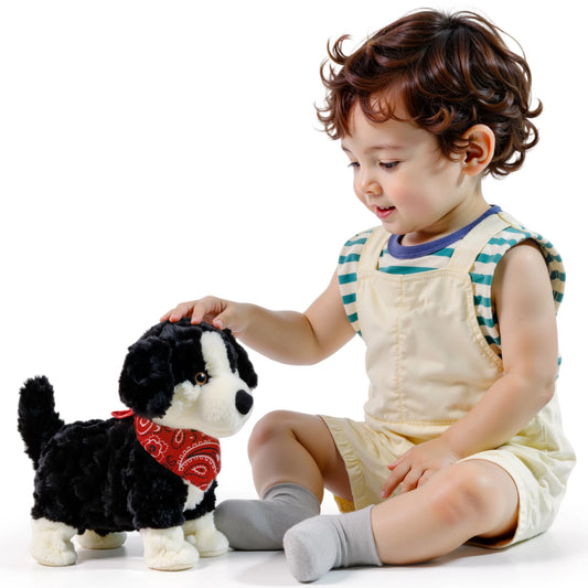 Young child playing with voice-controlled interactive plush puppy toy that walks, barks, sits, and sings – soft electronic pet dog for kids.